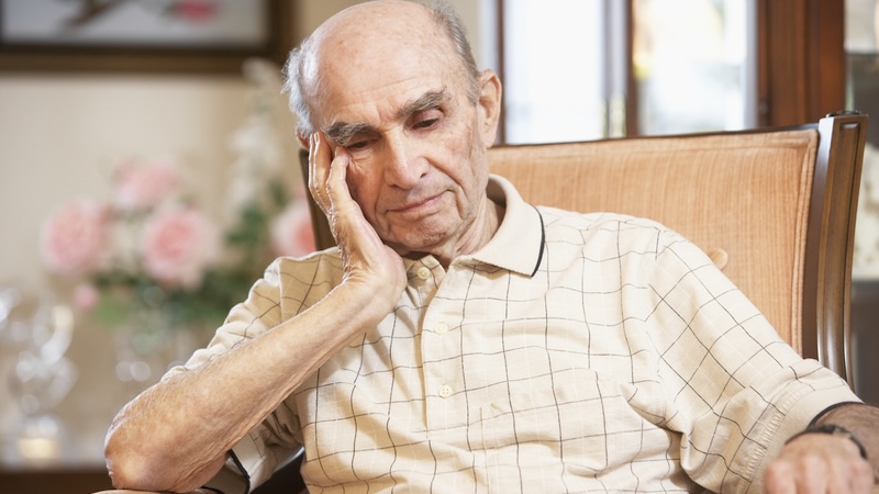 Man looking sad because his friends deserted him