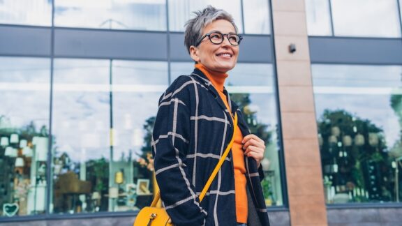 A woman out and about enjoying small pleasures in retirement