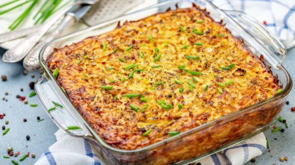 A potato vegetable kugel in a serving dish