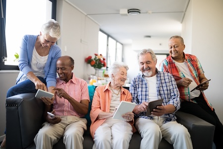 A group in a retirement community having fun after making the move to senior living.