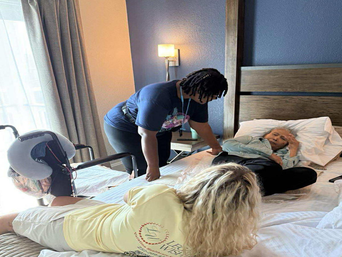 Legacy Wishes Caregivers Helping with Bed