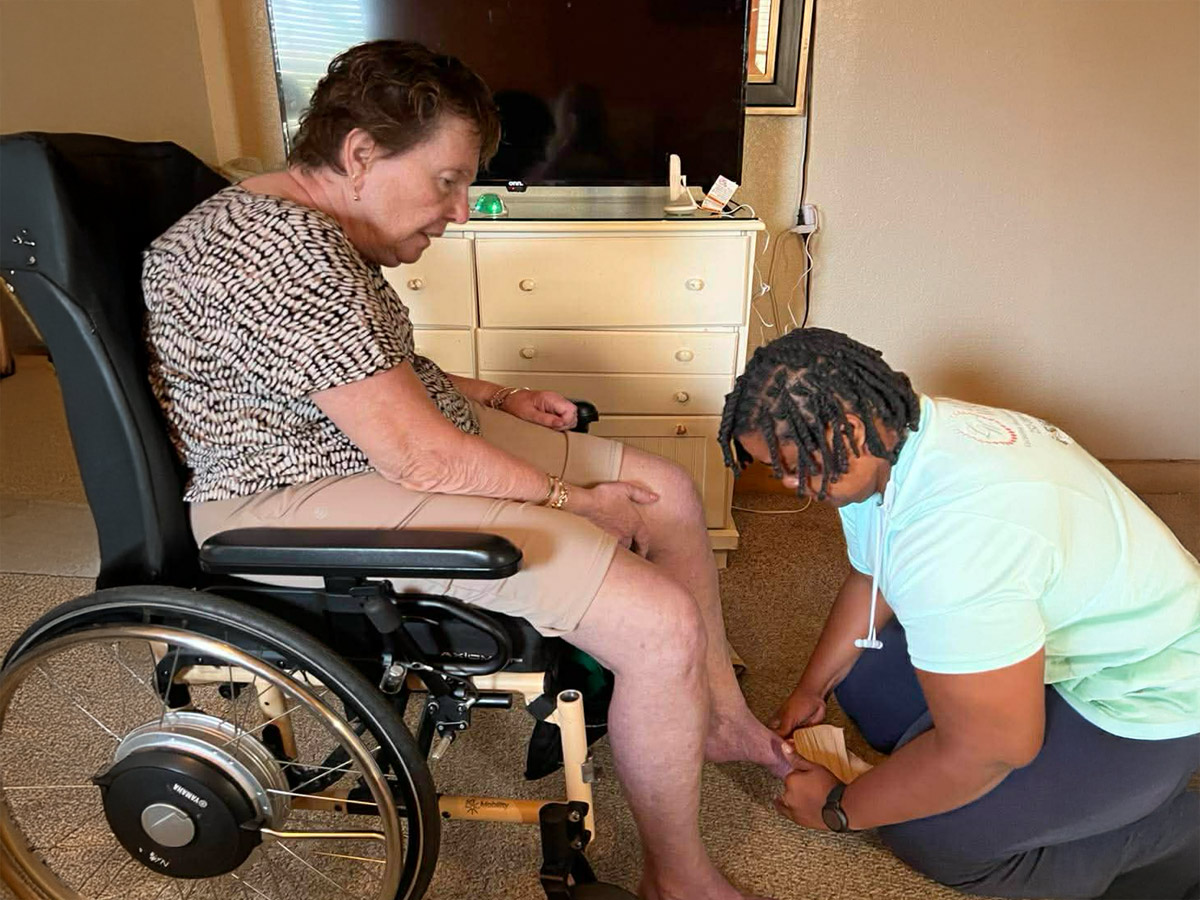 Legacy Wishes Caregiver Helping with Shoes