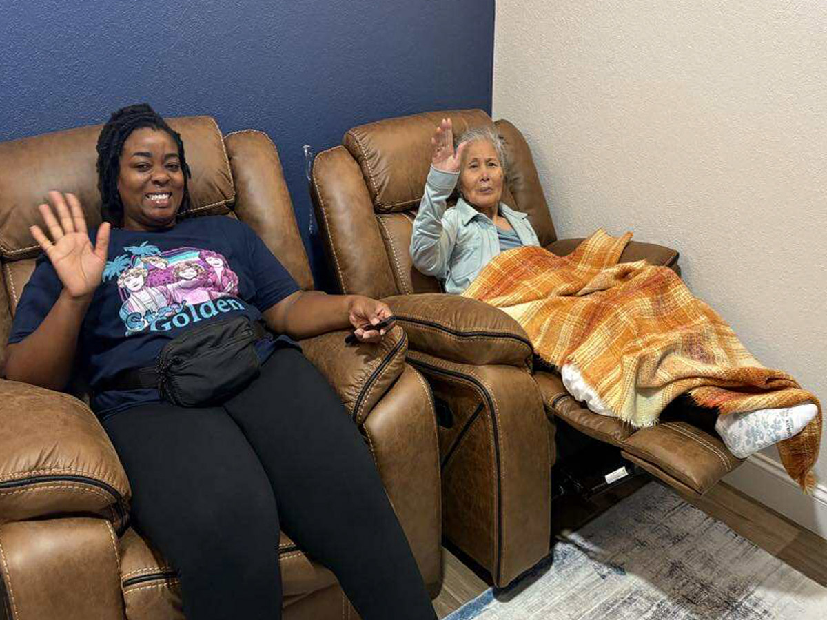 Legacy Wishes Caregiver Relaxing with Senior Lady
