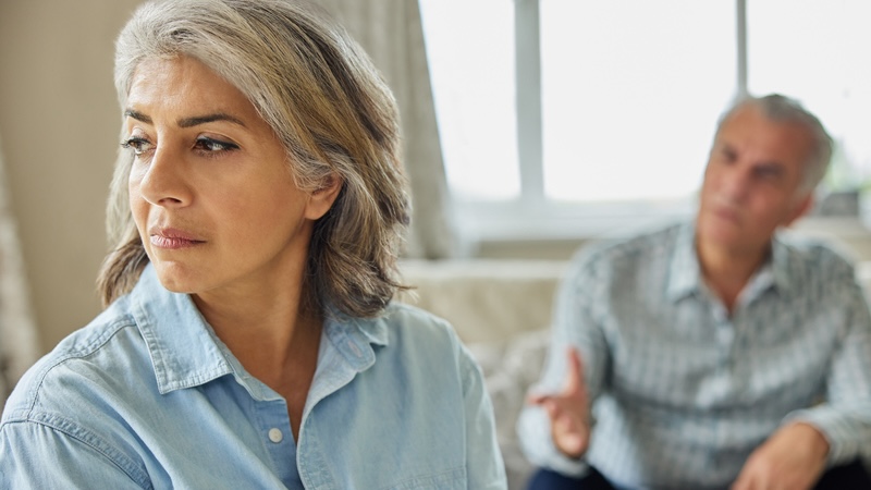 Senior couple fighting, considering gray divorce versus separation. Image by Katie Nesling