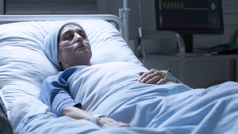 A woman in a hospital bed. This dying friend refuses contact.