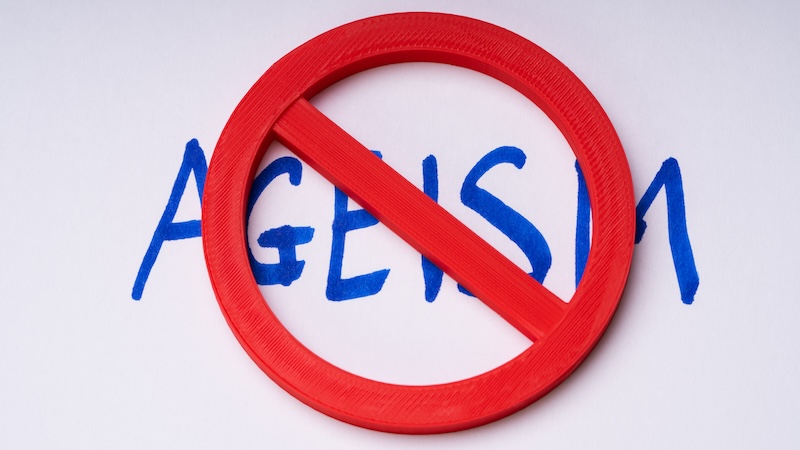 Ageism word with a red slash through it. Is honey ageist?