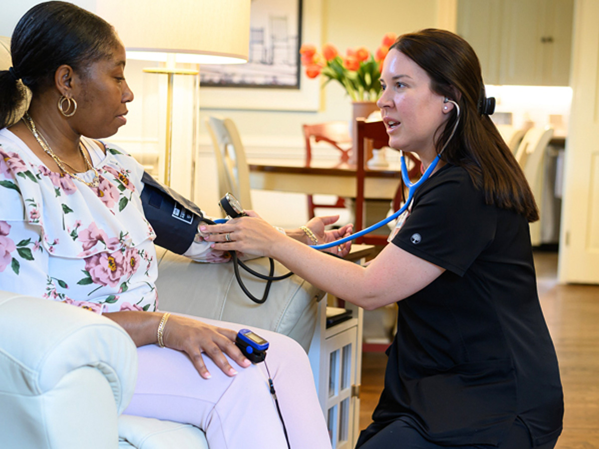 UNC Health Johnston Nurse Taking Blood Pressure Reading