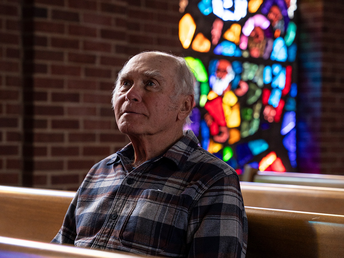 Hermitage Richmond Man Sitting in Pew at Church