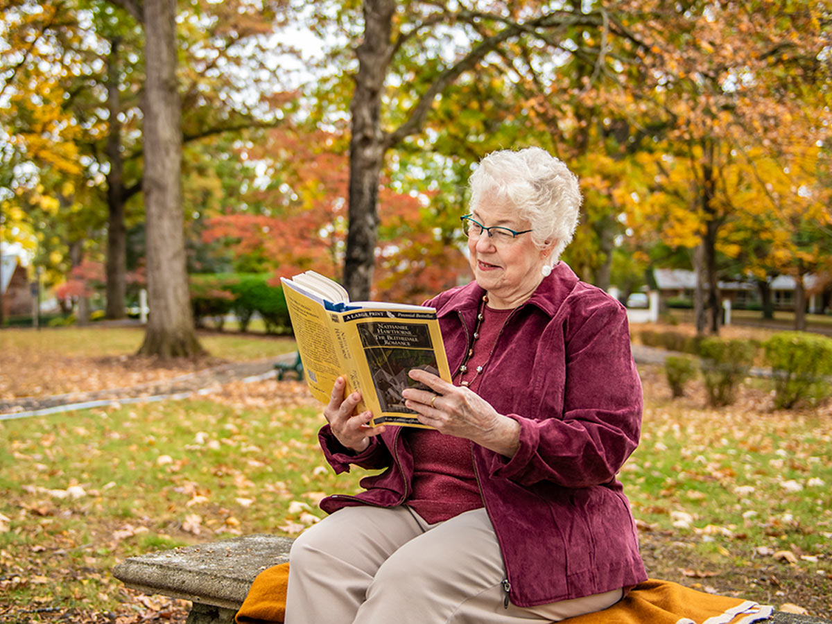 Hermitage Roanoke Lady Outside Reading