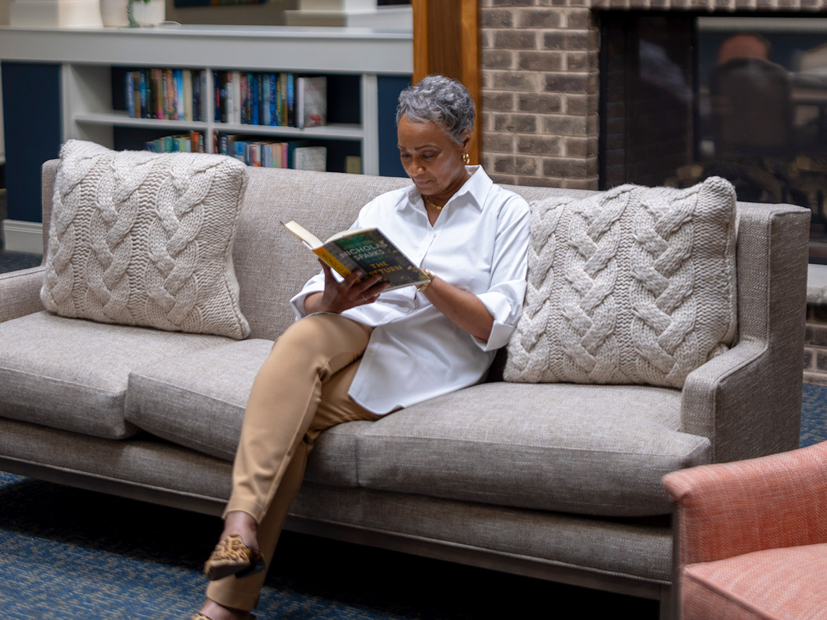 Hermitage Three Chopt Lady Reading on Sofa