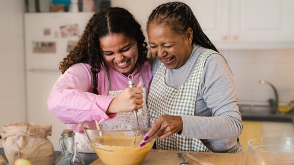 Becoming the Matriarch: African Grandmother in Kitchen. Alessandro Biascioli