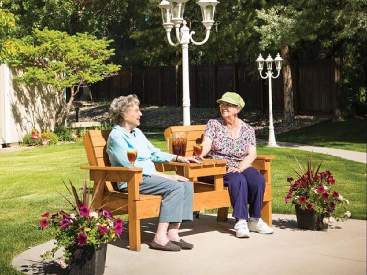 Grand Villa Friends Sitting Outside