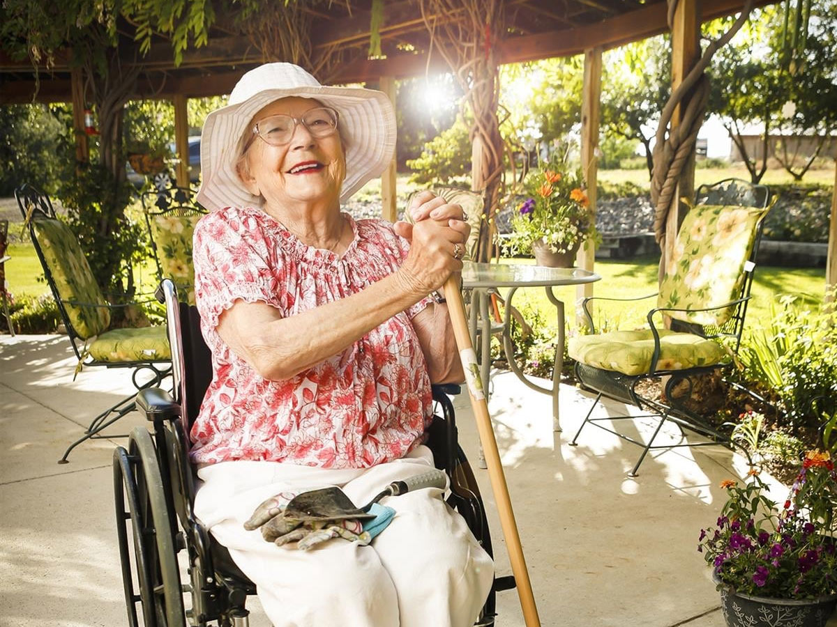 Grand Villa Lady Sitting Outside