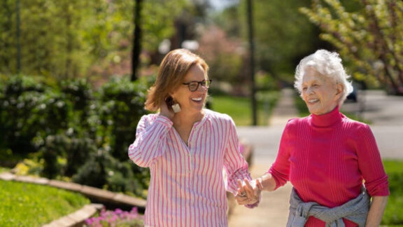 Naborforce Senior Lady and Friend Walking Outside