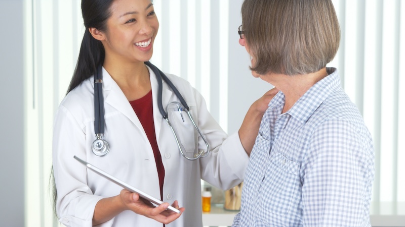 A senior woman getting personalized medicine in retirement.