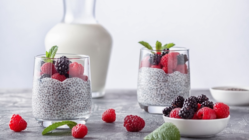 Berries ready to eat in bowls and glasses, a good example of fiber-rich foods