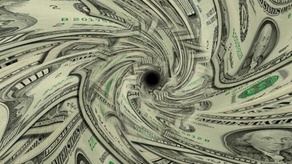 Money going down a black hole since sometimes care leads to financial ruin.
