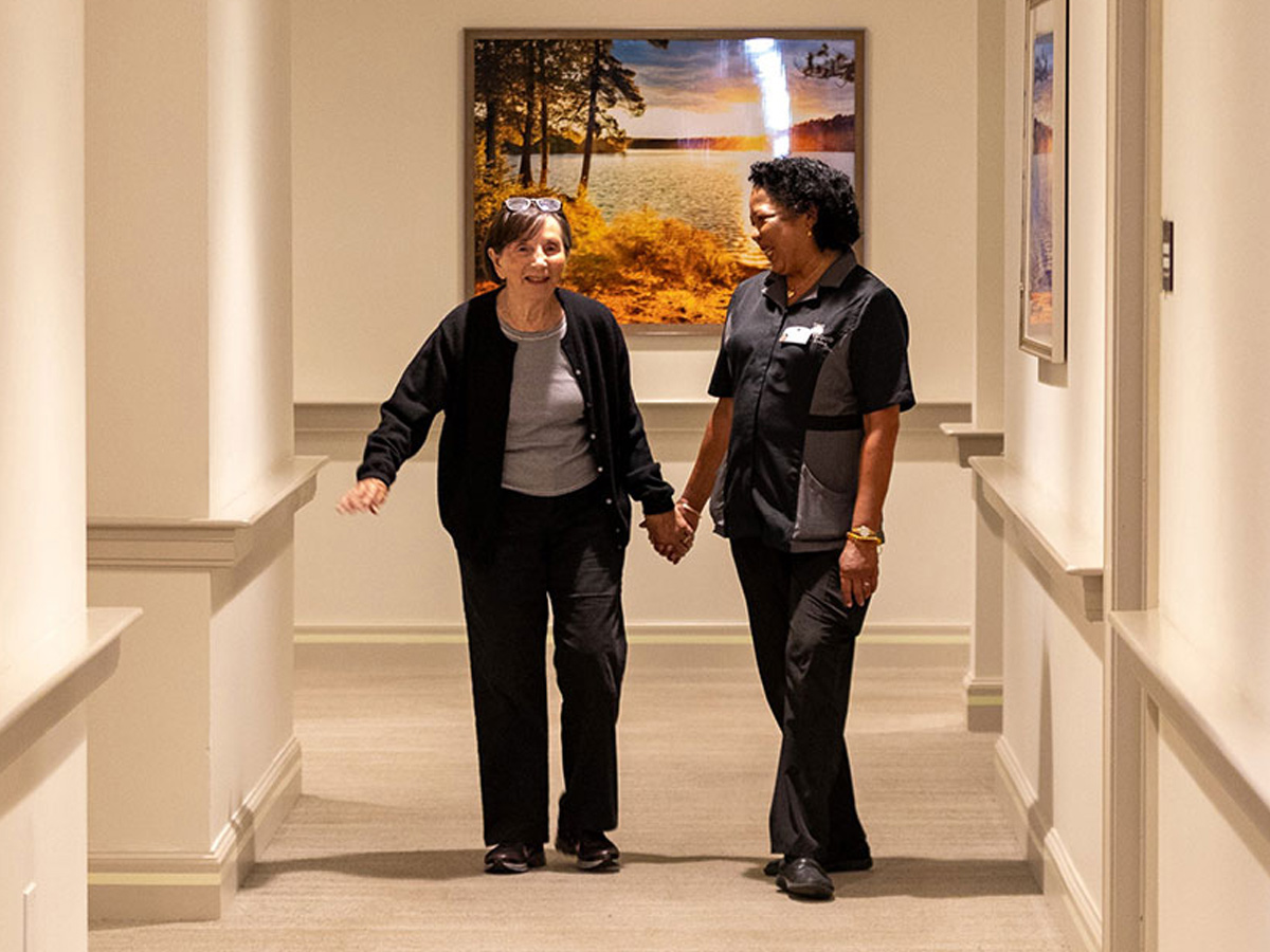 Maplewood at Stony Hill Lady and Caregiver Walking