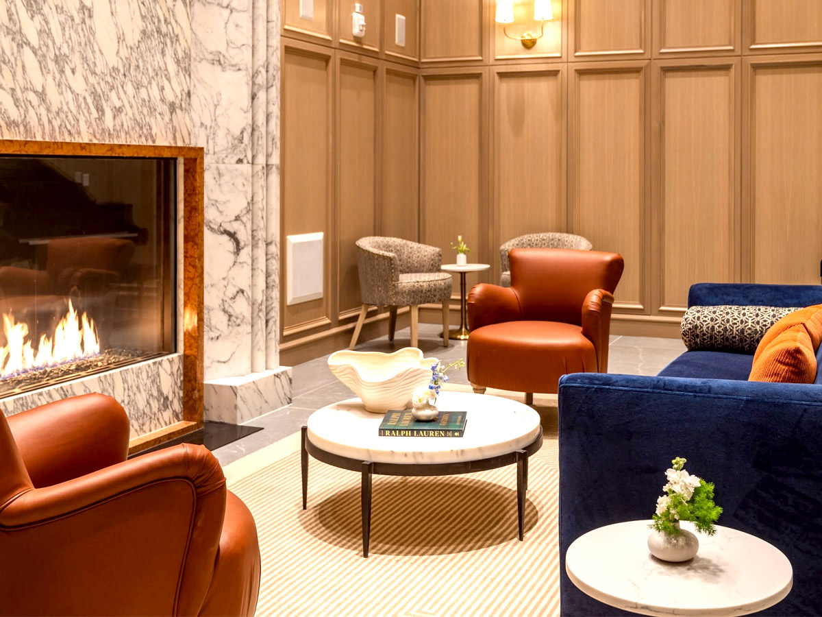 Inspir Embassy Row Community Living Room Fireplace
