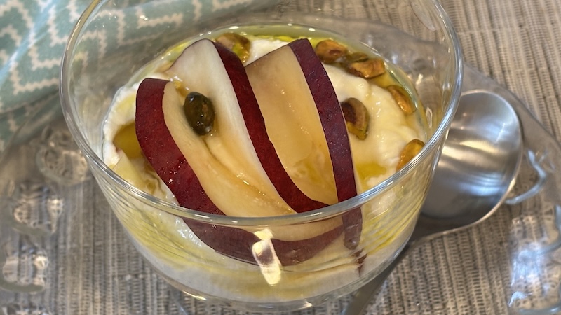 Peaches and cream in a bowl