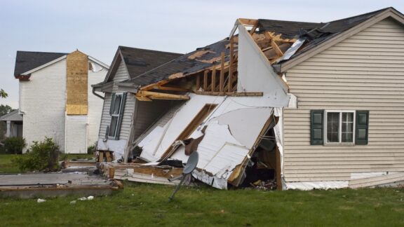 Storm damage to a home after tornado or storm microburst, for article on accessing Medicare during a disaster. Wisconsinart