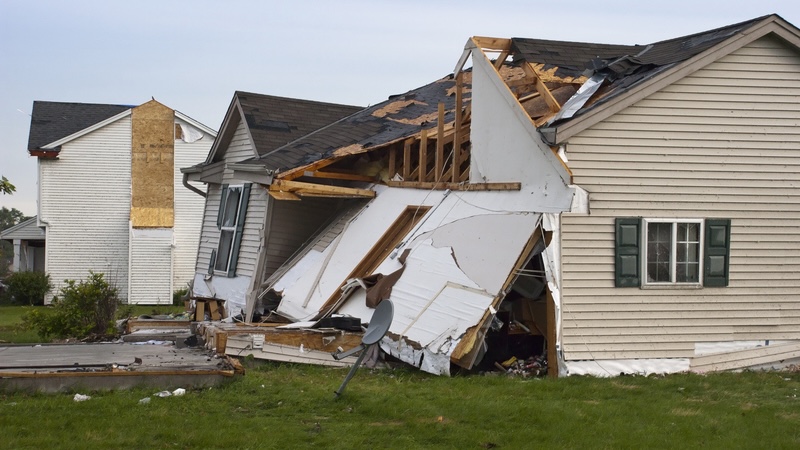 Storm damage to a home after tornado or storm microburst, for article on accessing Medicare during a disaster. Wisconsinart
