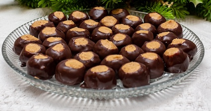 Chocolate peanut butter buckeyes on serving trey