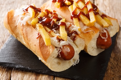 Two Polish Boy hot dogs with cole slaw, fries, and barbecue sauce, among the iconic Ohio foods.