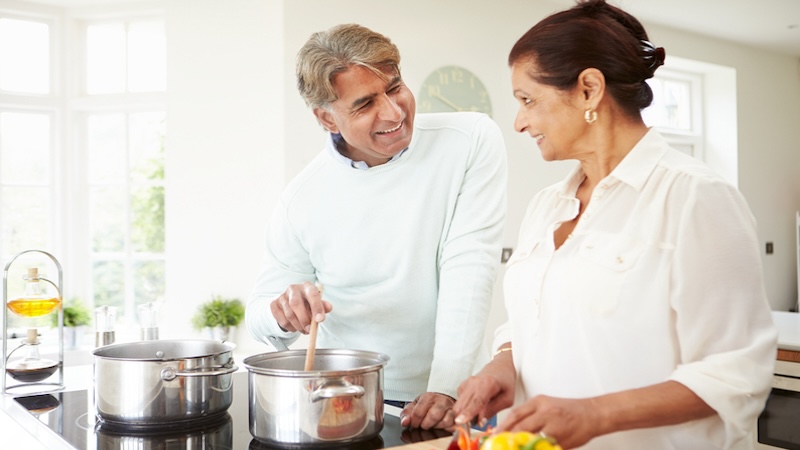 batch cooking for seniors in their kitchen. Monkey Business Images