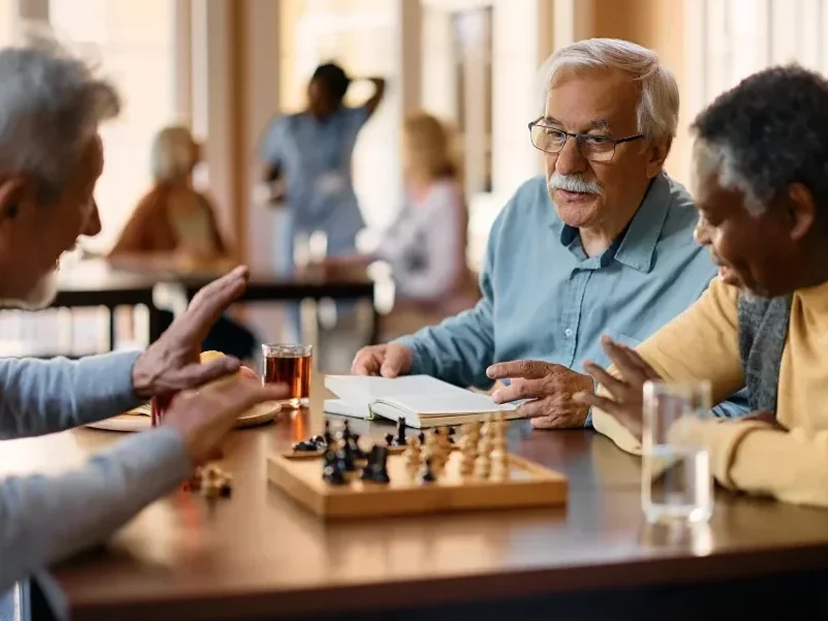 Milestone Stoughton Friends Playing Chess