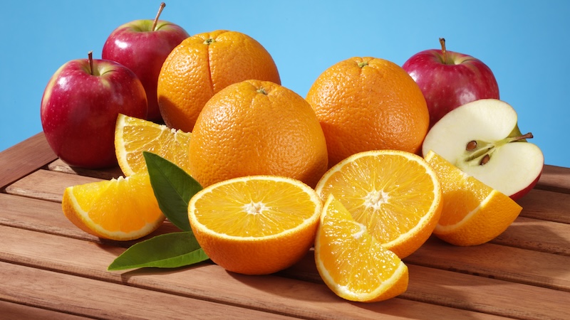 A variety of fruits, like apples and oranges, that will give you more energy when eaten.