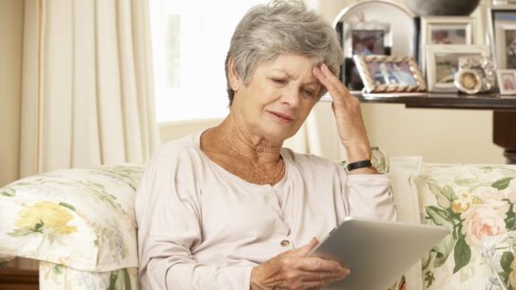 senior woman getting online mental health advice. Monkey Business Images