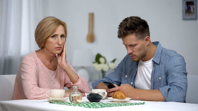 A mother irritated at son since she's ready to downsize but he doesn't want to move.