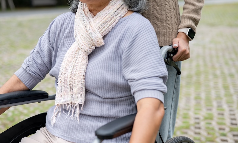 A daughter with her senior mother getting paid as caregiver.
