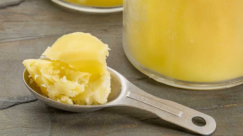 A scoop of ghee ready for a balanced breakfast.