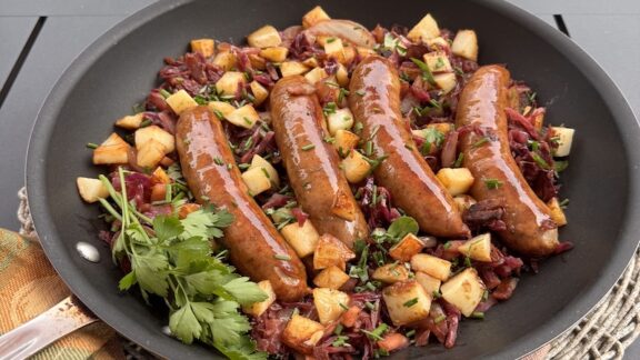 Bratwurst in a skillet ready to eat.
